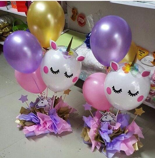 centro de mesa con globos para fiesta unicornio